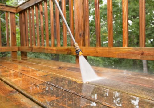 Pressure Washing Equipment Being Used to Perform Professional Deck Cleaning for Peoria IL