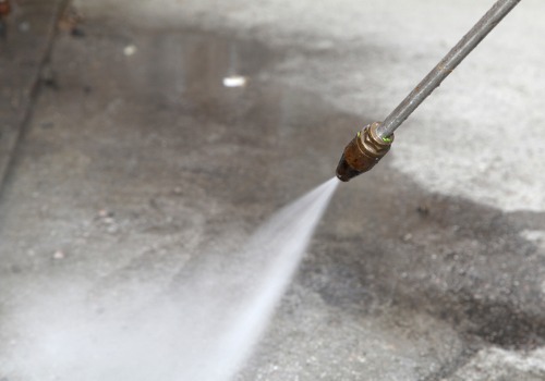 Pressure Washer Used to Perform Professional Concrete Cleaning for Peoria IL